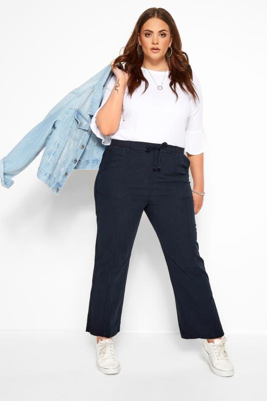 Wide-leg trousers with high-neck tops for interviews